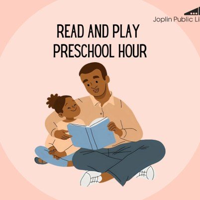 Dad reading to daughter